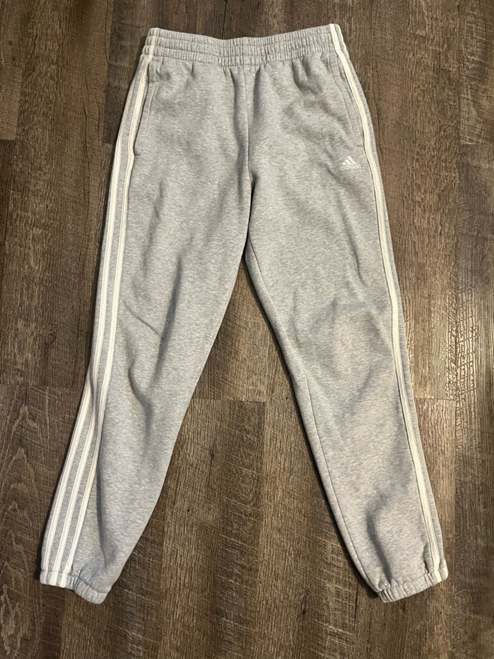 Unisex adidas Light Gray Kids Joggers with white stripes